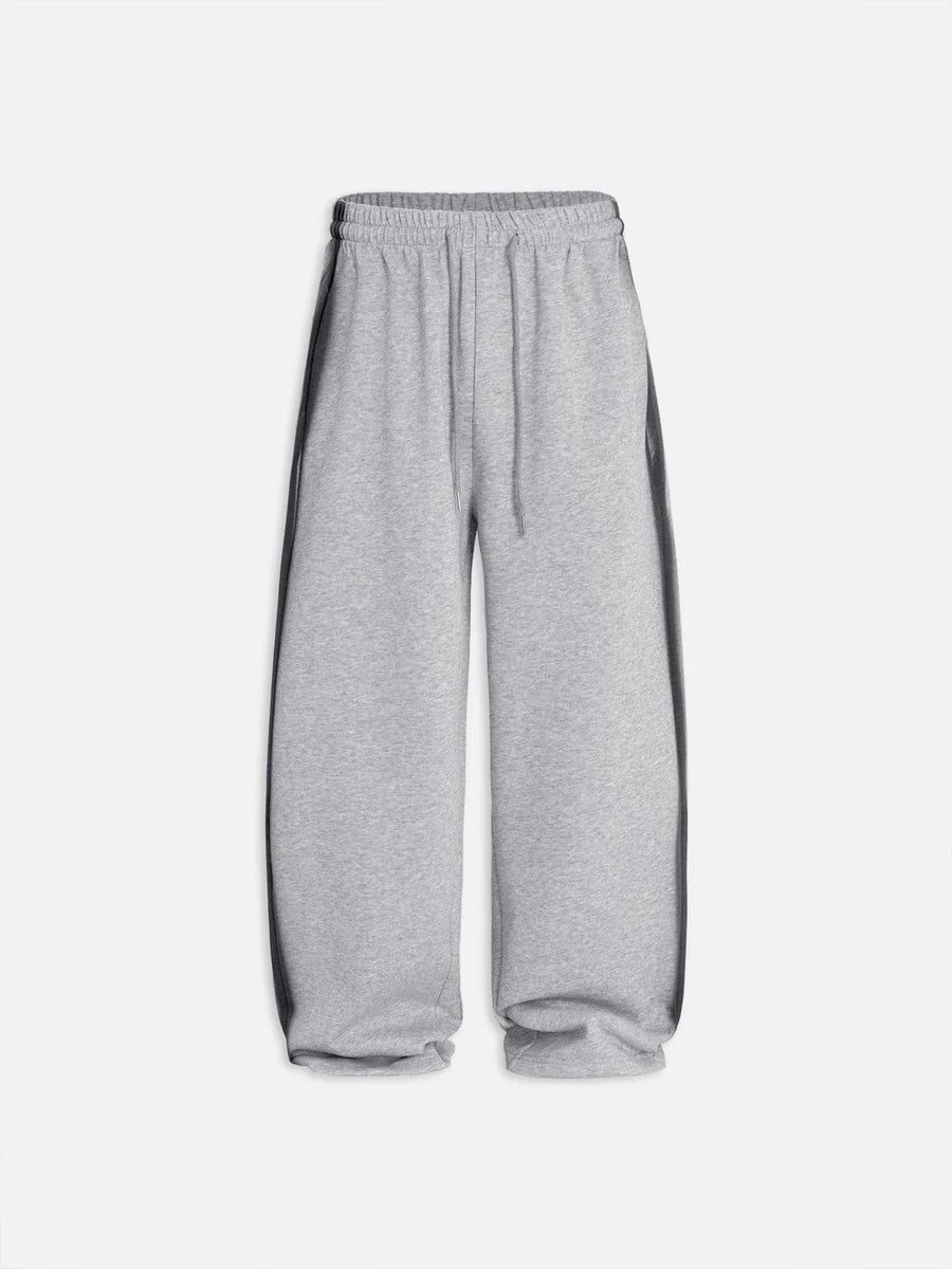 Pantalones deportivos holgados con corazon de grafiti